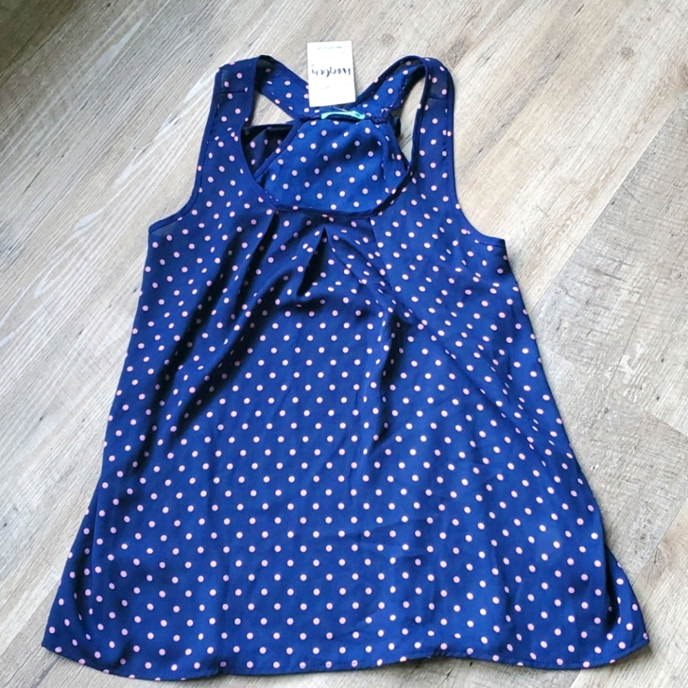 Polka dot tank with back bow